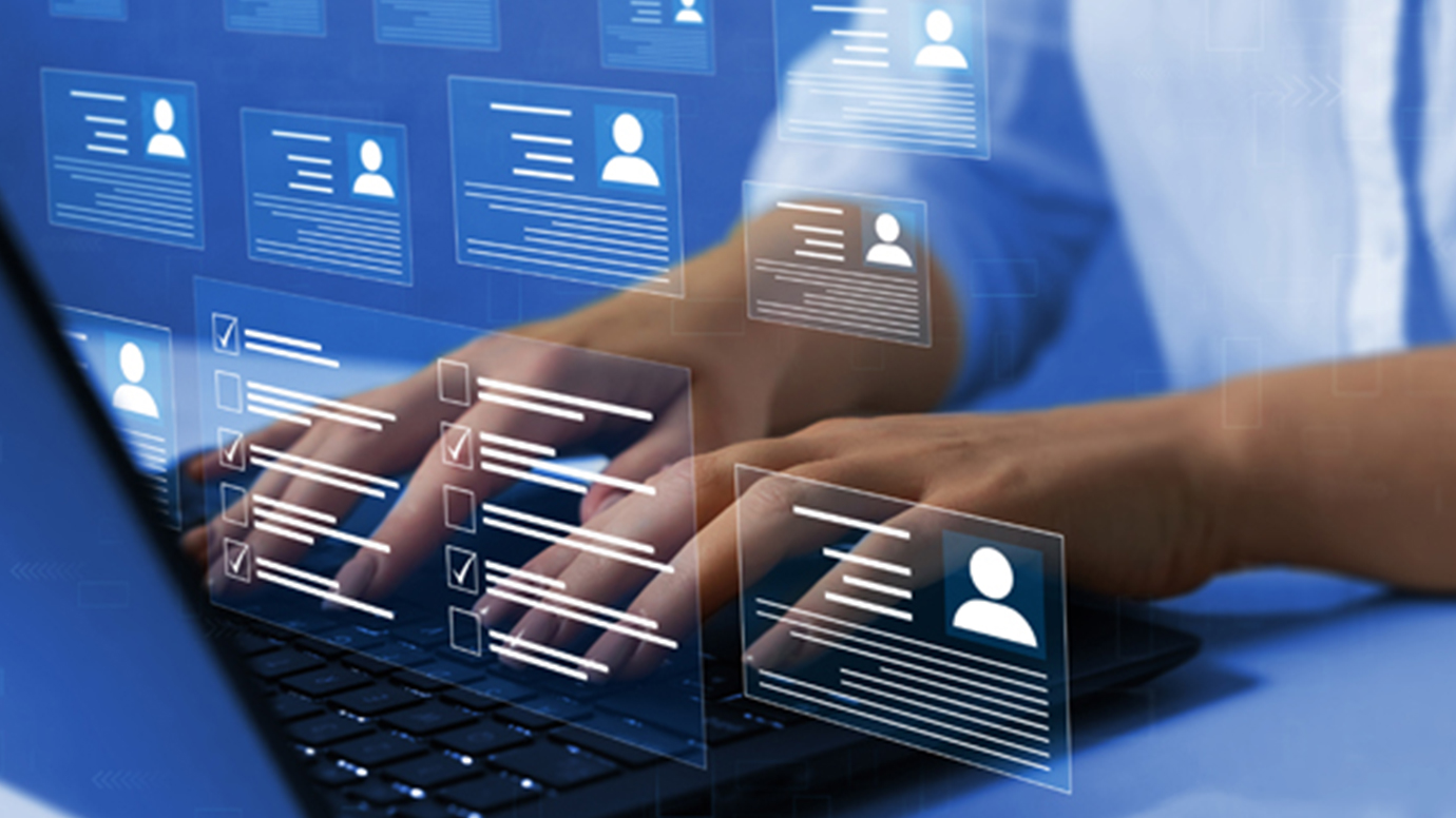 Hands typing on a laptop keyboard with a virtual screen in the foreground.