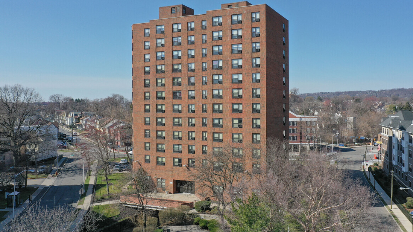 A high-rise senior living housing community in a mixed residential neighborhood .